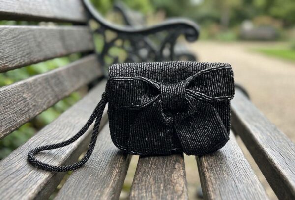 6514b890-fa46-4533-87e0-e2ed7b023731 The Luxury Heirloom Bow Clutch