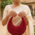 Ruby Radiance Crescent Clutch