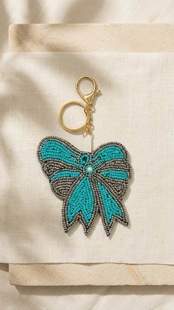 pomelli_photoshoot_image_9_16_0630 (23) Turquoise Bow Beaded Keychain