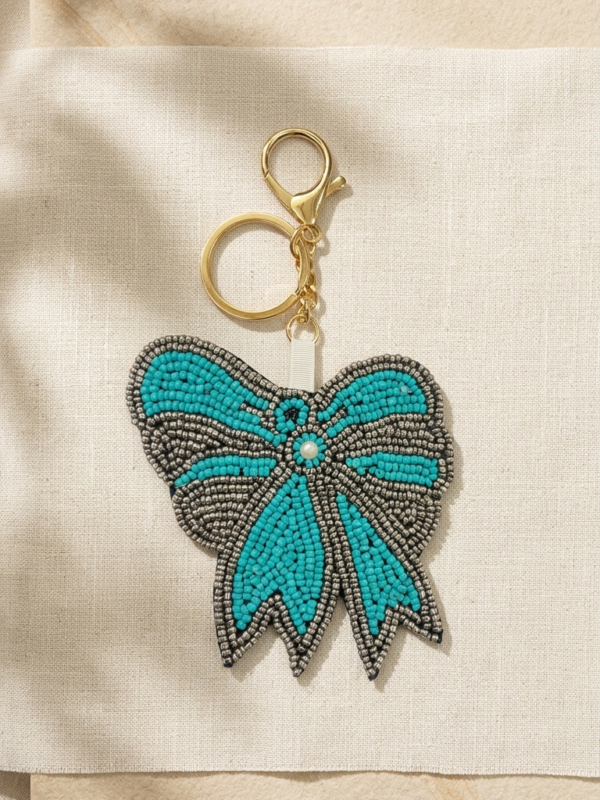 pomelli_photoshoot_image_9_16_0630 (23) Turquoise Bow Beaded Keychain