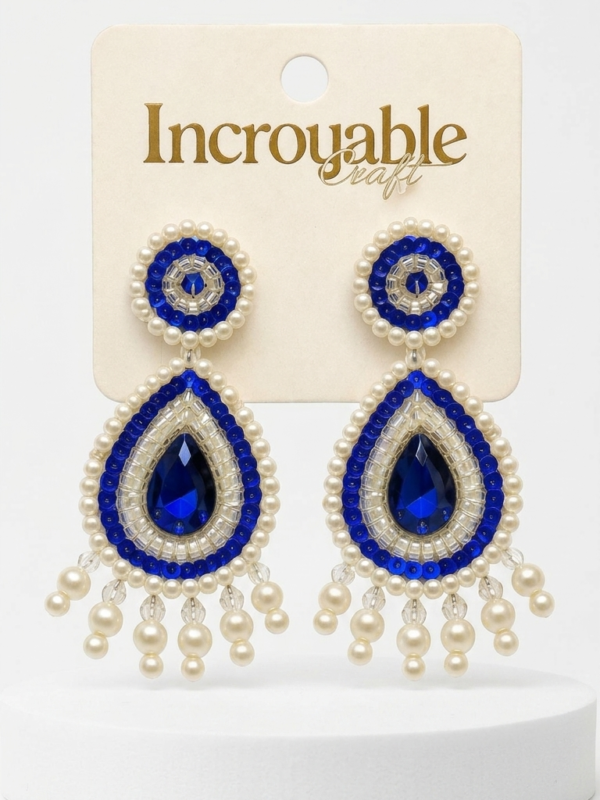 pomelli_photoshoot_image_9_16_0703 (1) Royal Sapphire Pearl Drop Earrings