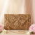 Golden Radiance Beaded Clutch